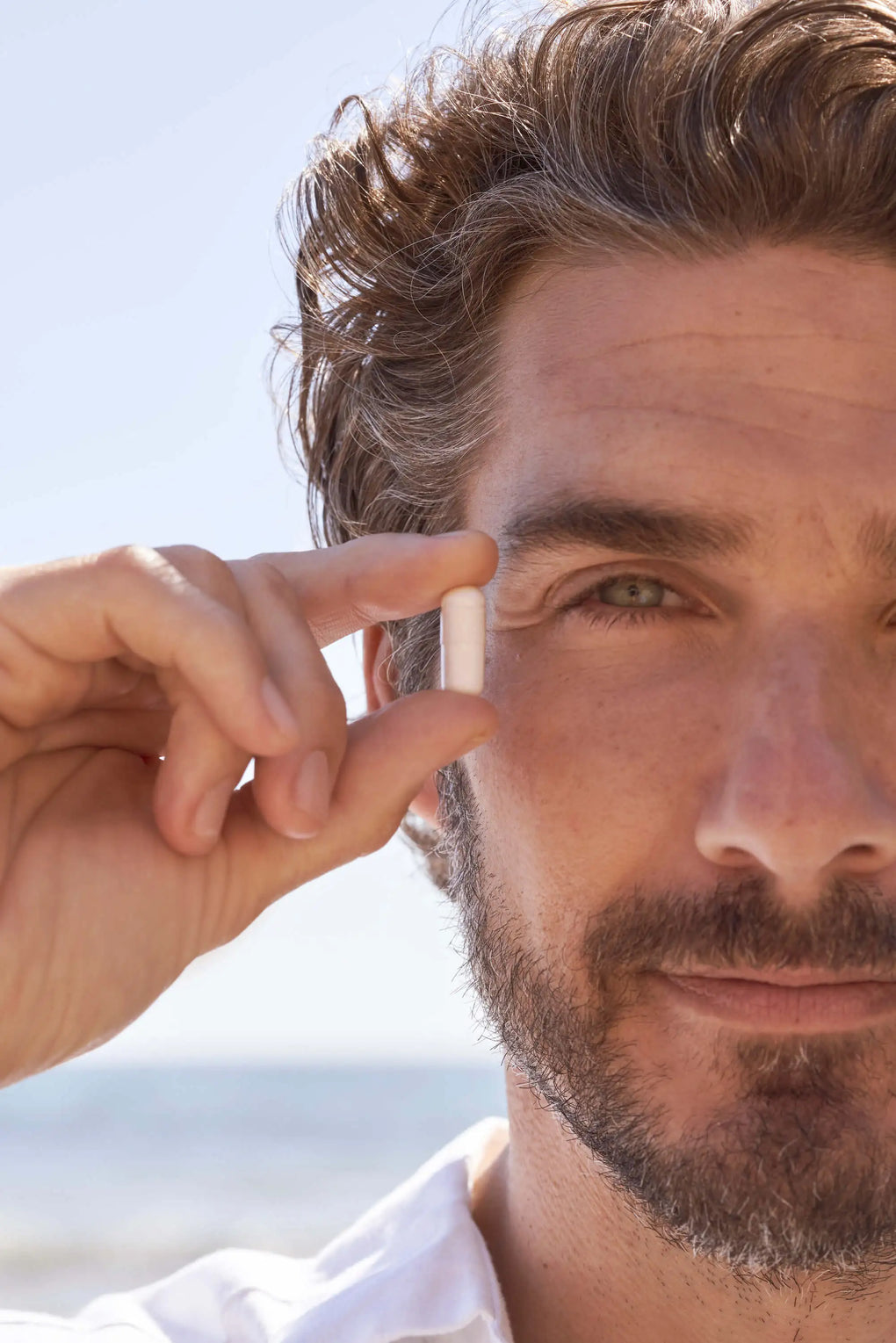 Man with Khelp- natural heartburn & acid reflux supplement